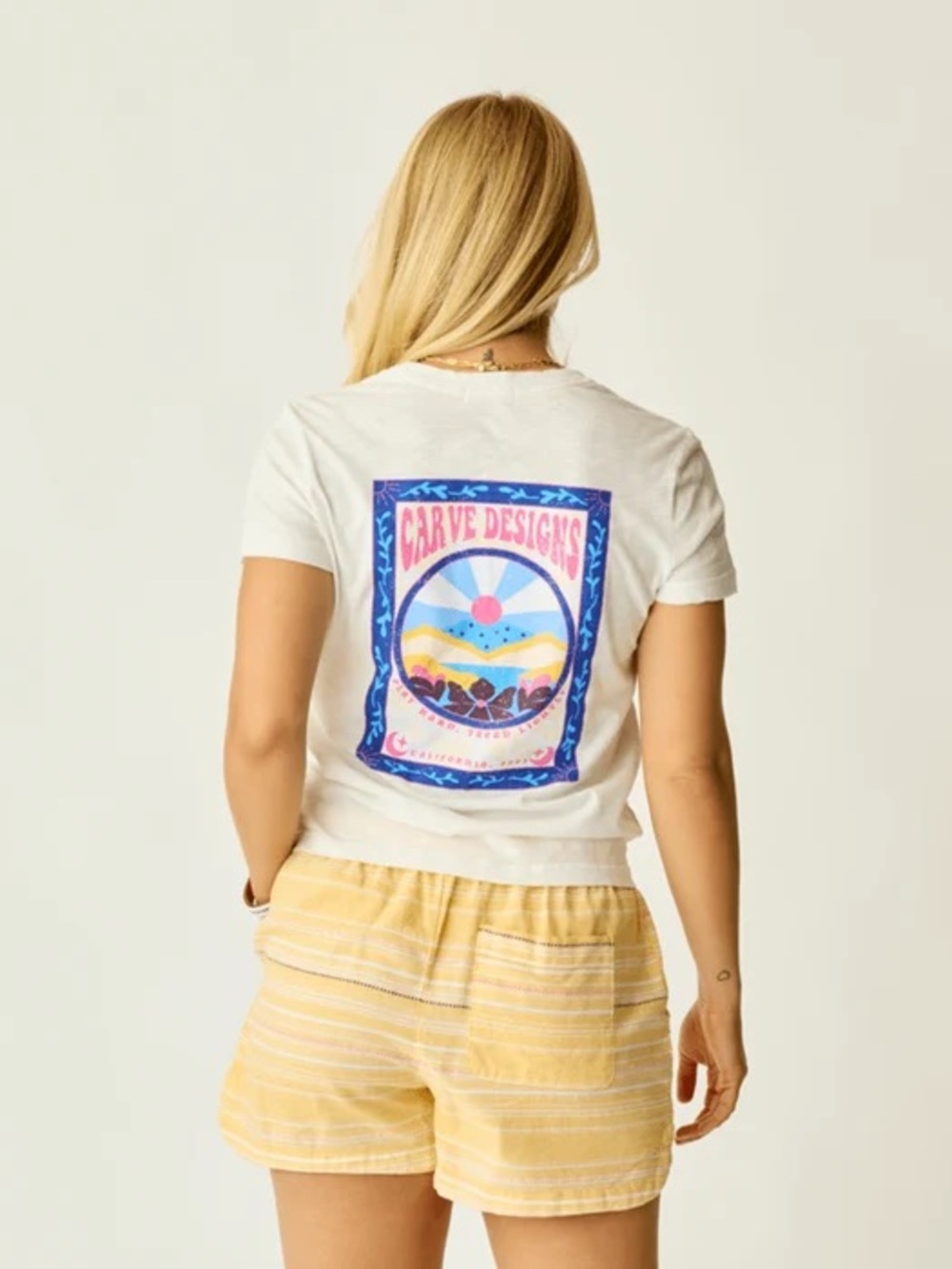 Carve Designs White Graphic Tee with Yellow Striped Women’s Shorts